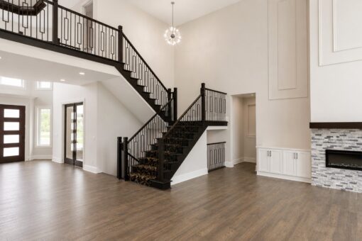 Turnberry custom home in New Berlin by Kingfogl – great room staircase and front entry