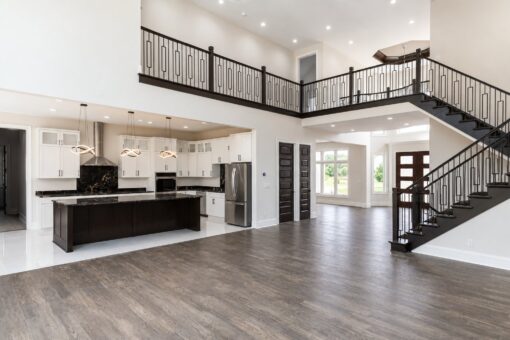 Turnberry custom home in New Berlin by Kingfogl – great room kitchen and staircase wide