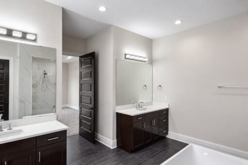 Turnberry custom home in New Berlin by Kingfogl – master bath vanity and shower