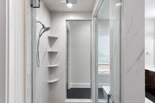 Turnberry custom home in New Berlin by Kingfogl – master bath shower and tub view