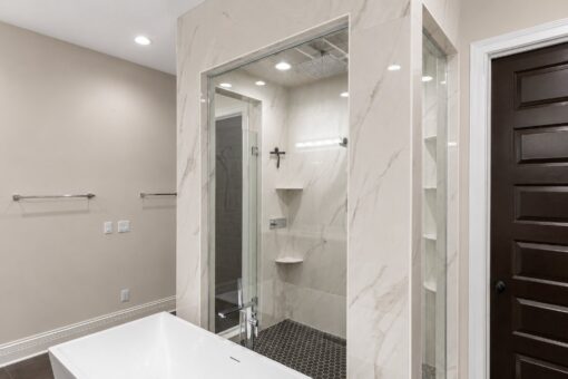 Turnberry custom home in New Berlin by Kingfogl – master bath tub and shower