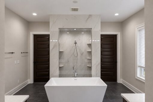 Turnberry custom home in New Berlin by Kingfogl – master bath tub and shower front view