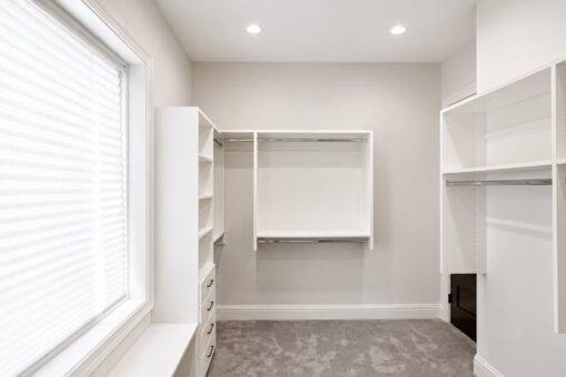Turnberry custom home in New Berlin by Kingfogl – master closet wide view