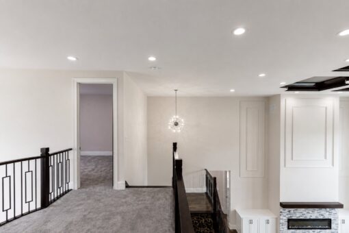 Turnberry custom home in New Berlin by Kingfogl – upper hall loft and balcony
