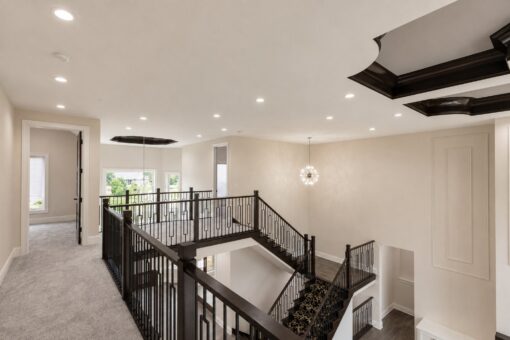 Turnberry custom home in New Berlin by Kingfogl – upper hall balcony and staircase