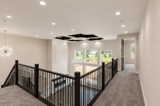 Turnberry custom home in New Berlin by Kingfogl – upper hall balcony and coffered ceiling