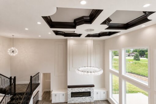 Turnberry custom home in New Berlin by Kingfogl – upper hall coffered ceiling and great room below