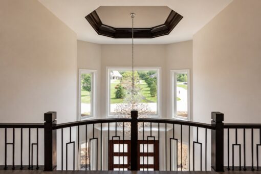 Turnberry custom home in New Berlin by Kingfogl – balcony front window bay and chandelier