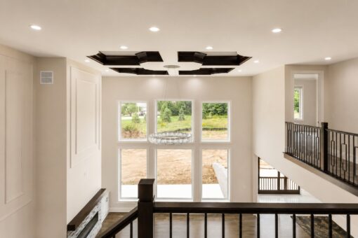 Turnberry custom home in New Berlin by Kingfogl – balcony great room window wall