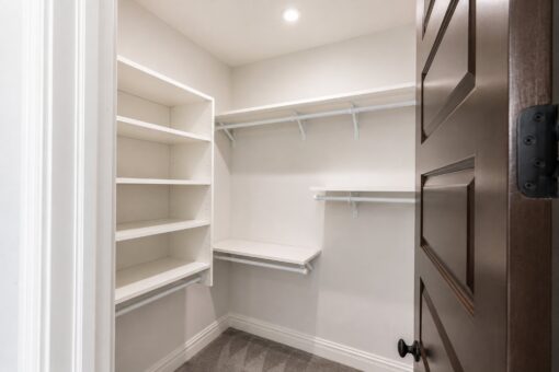 Turnberry custom home in New Berlin by Kingfogl – bedroom closet shelving and hanging rod