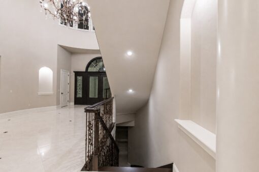 Vizzini custom home in Franklin by Kingfogl – 1st floor - staircase landing