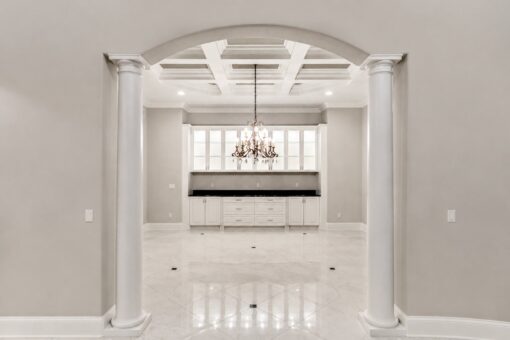 Vizzini custom home in Franklin by Kingfogl – 1st floor - dining room archway
