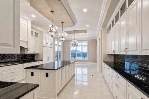 Vizzini custom home in Franklin by Kingfogl – 1st floor - kitchen island and breakfast area - day