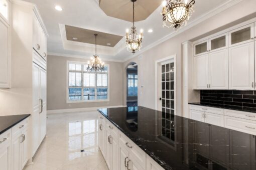 Vizzini custom home in Franklin by Kingfogl – 1st floor - kitchen island and breakfast area