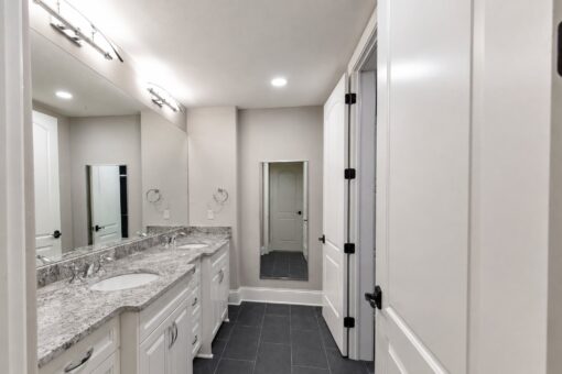 Vizzini custom home in Franklin by Kingfogl – 1st floor - guest bathroom vanity