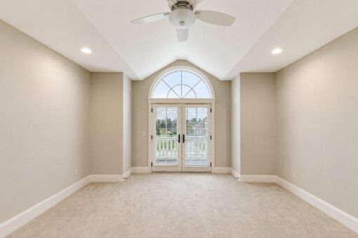 Vizzini custom home in Franklin by Kingfogl – 2nd floor - bedroom with french doors - day