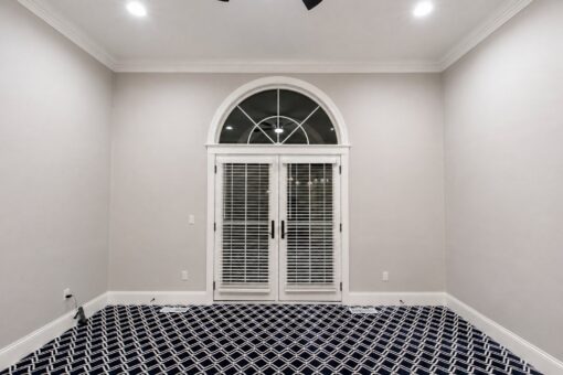Vizzini custom home in Franklin by Kingfogl – 2nd floor - bedroom with french doors - night