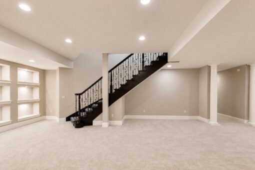 Vizzini custom home in Franklin by Kingfogl – basement - recreation room stairs and shelves - view 1