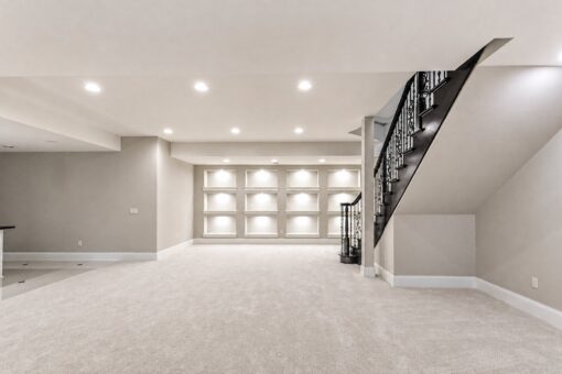 Vizzini custom home in Franklin by Kingfogl – basement - recreation room stairs and shelves - view 2