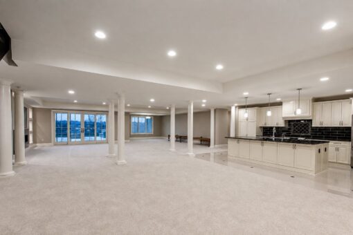 Vizzini custom home in Franklin by Kingfogl – basement - recreation room and kitchen - view 1
