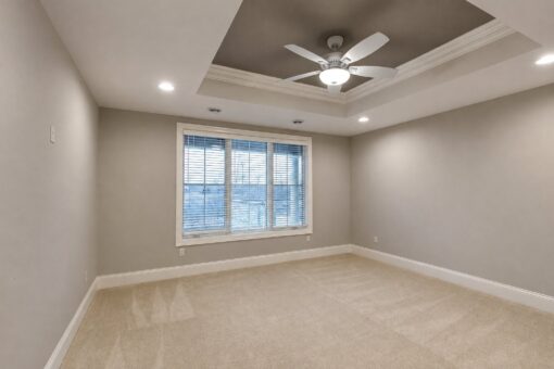 Vizzini custom home in Franklin by Kingfogl – basement - bedroom - view 1