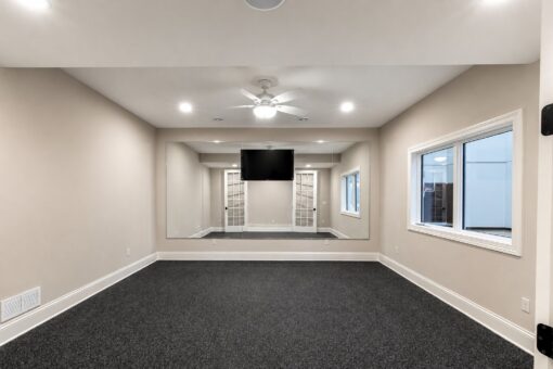 Vizzini custom home in Franklin by Kingfogl – basement - exercise room
