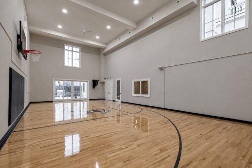 Vizzini custom home in Franklin by Kingfogl – basement - basketball court - angle 2