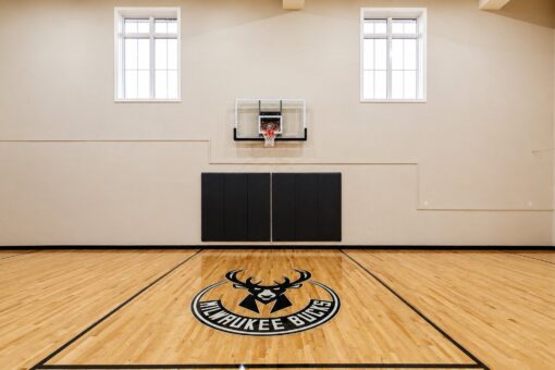 Vizzini custom home in Franklin by Kingfogl – basement - basketball court hoop - front