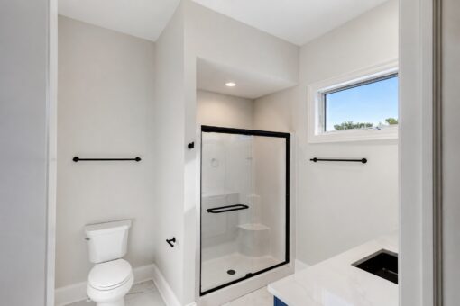 Apex bathroom with black-framed shower