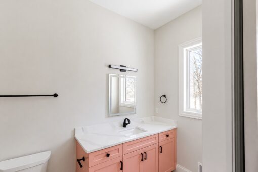 Apex bathroom with coral vanity
