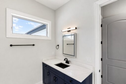 Apex bathroom with navy vanity