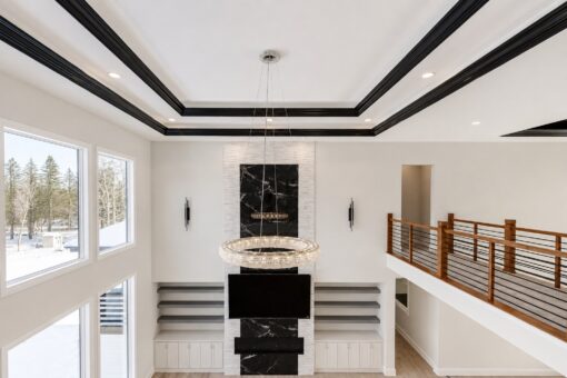 Apex black marble fireplace and built-ins from the balcony