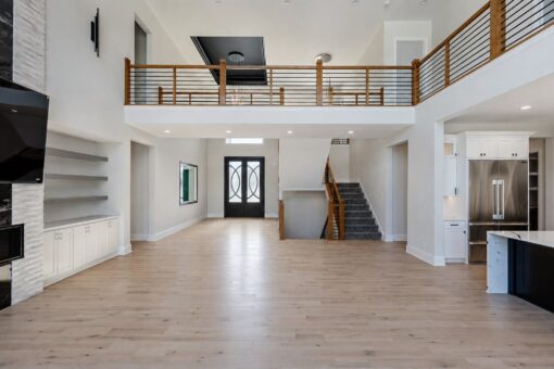 Apex great room built-ins and view to the foyer