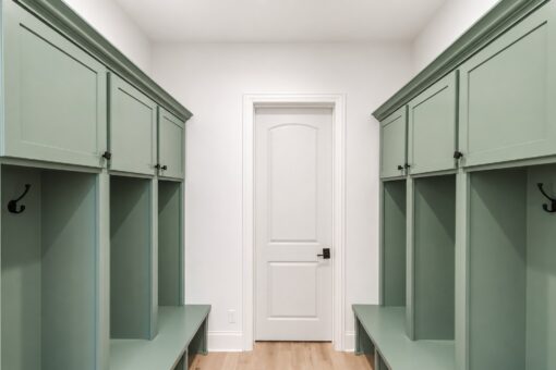 Apex mudroom with green lockers and bench