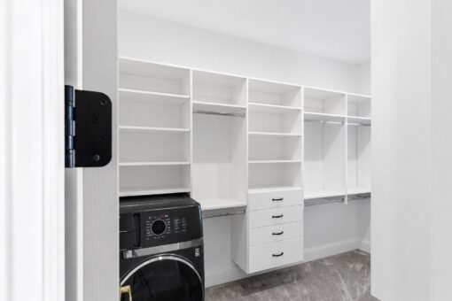 Apex primary closet with built-in laundry