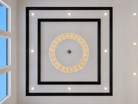 Apex tray ceiling with ring chandelier