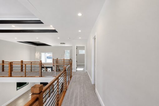 Apex upper hallway with balcony railing