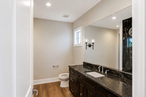 Ridge bathroom with dark granite vanity