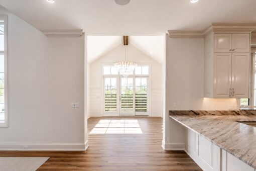 Ridge breakfast area with vaulted ceiling and French doors
