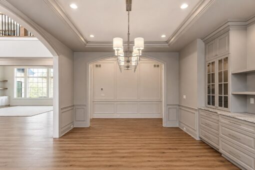 Ridge dining room with tray ceiling and built-in buffet