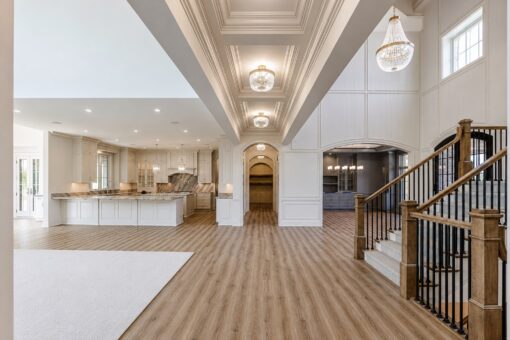 Ridge foyer with arched hallway and view to the kitchen