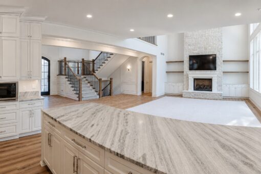 Ridge kitchen island with view to the great room and staircase