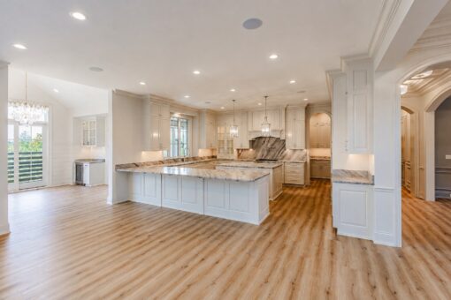 Ridge kitchen with two islands and arched pantry entry