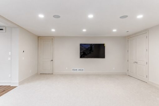 Ridge lower-level media room with wall-mounted TV