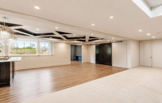 Ridge lower level with coffered ceiling and barn doors