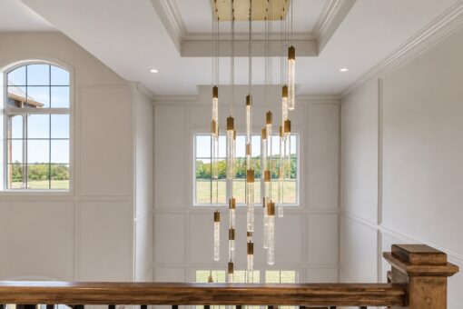 Ridge modern chandelier and arched window from the balcony