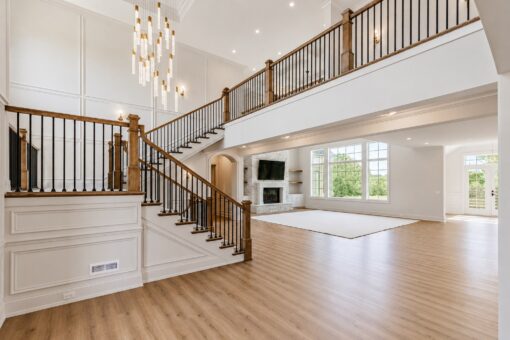 Ridge two-story foyer with modern chandelier and balcony